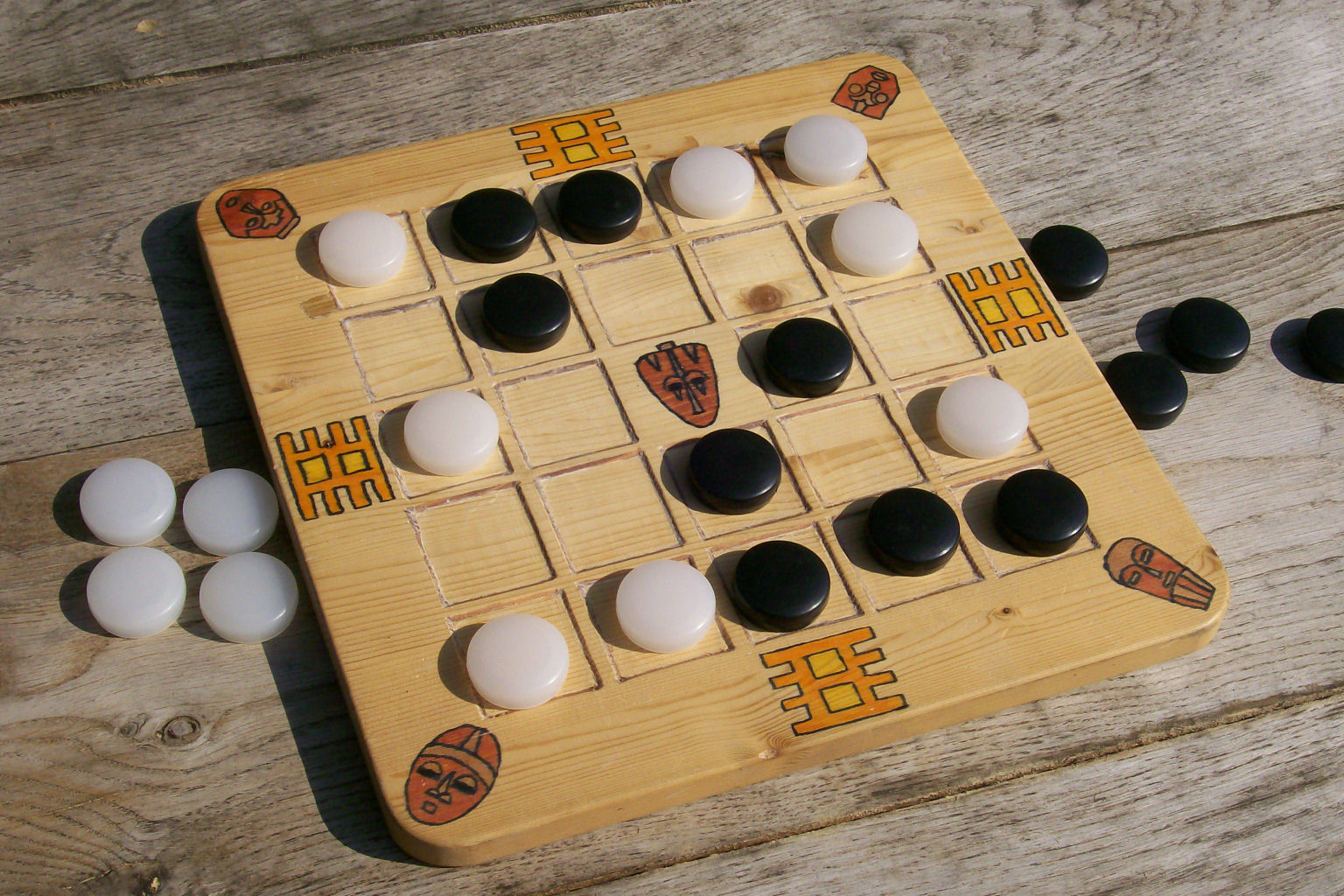 Yoté - um jogo de estratégia de origem africana, considerado como